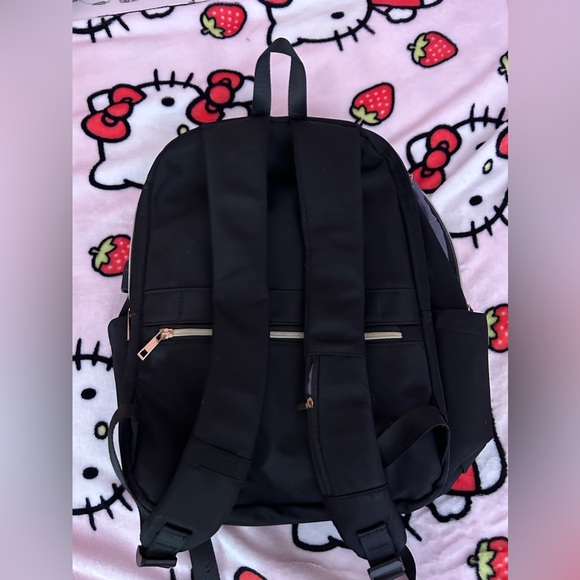 modoker backpack! Very spacious and has a charger input!! Fits laptops and etc - Picture 5 of 6